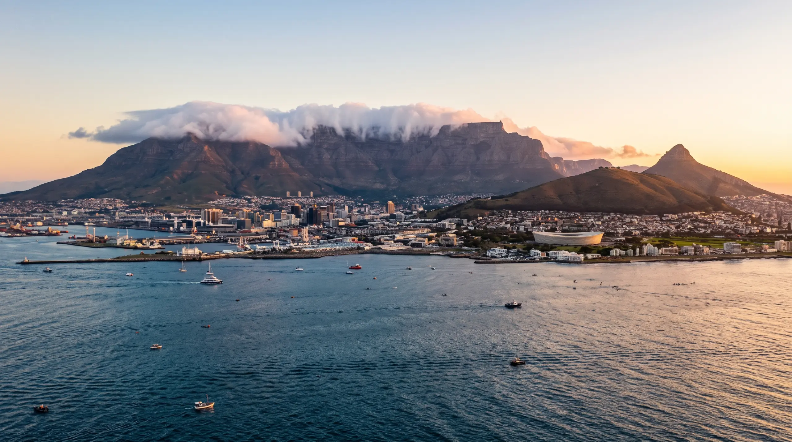 Table Mountain above Cape Town at golden hour, seen across Table Bay